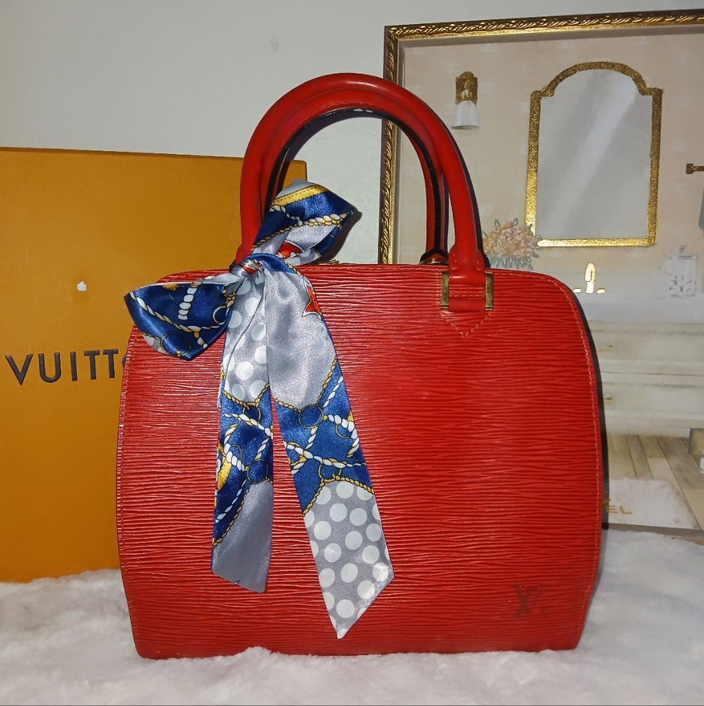 Louis Vuitton Epi Pont Neuf Red Handbag.